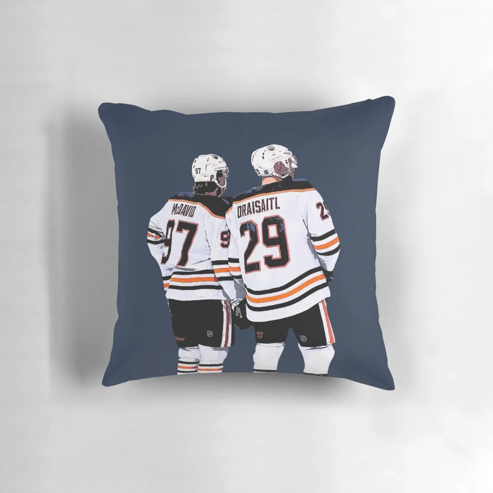 Edmonton Oilers hockey-themed pillow with images of players Connor McDavid and Leon Draisaitl