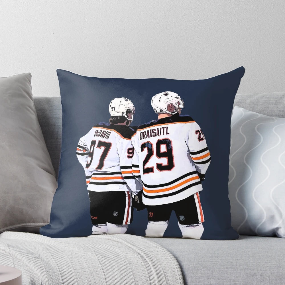 Edmonton Oilers hockey-themed pillow with images of players Connor McDavid and Leon Draisaitl