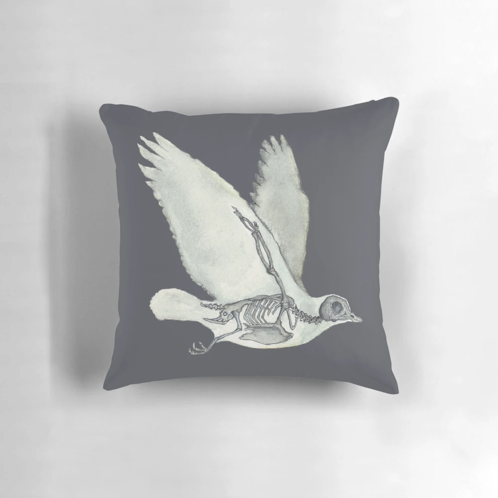 Detailed watercolor illustration of a bird skeleton or dove anatomy on a decorative throw pillow.