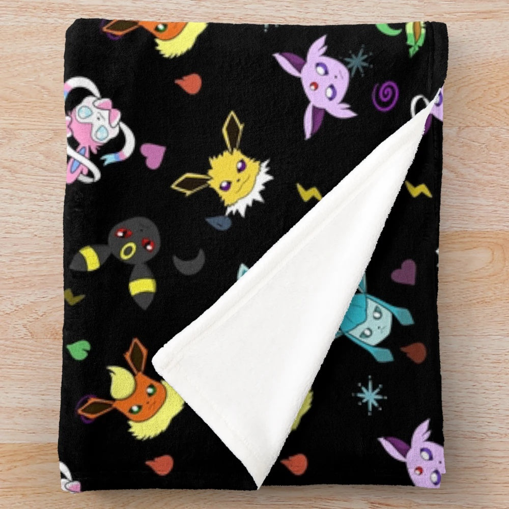 Eeveelution-inspired plush blanket featuring various Pokemon types