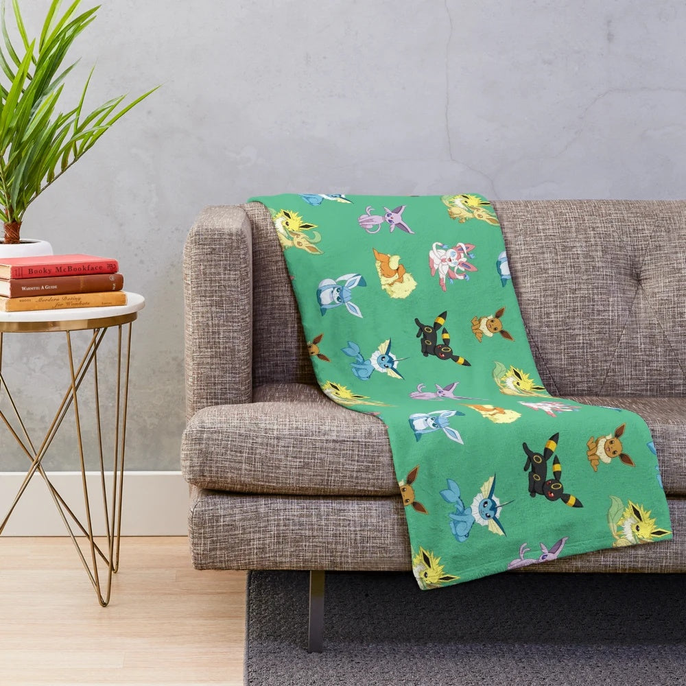Eeveelutions themed plush blanket featuring different Eeveelution designs