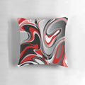Decorative throw pillow with abstract, marbled red, gray, black, and white fluid design