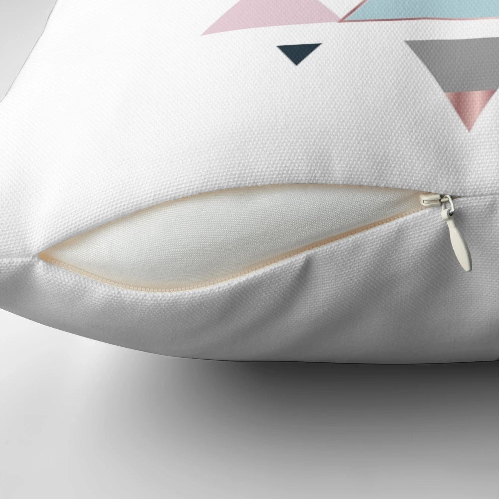 Stylish abstract triangle pattern pillow in shades of pink, teal, and blue