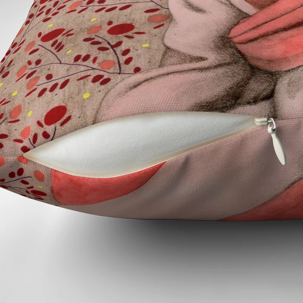 Decorative pink and white pattern pillow featuring a portrait of a woman