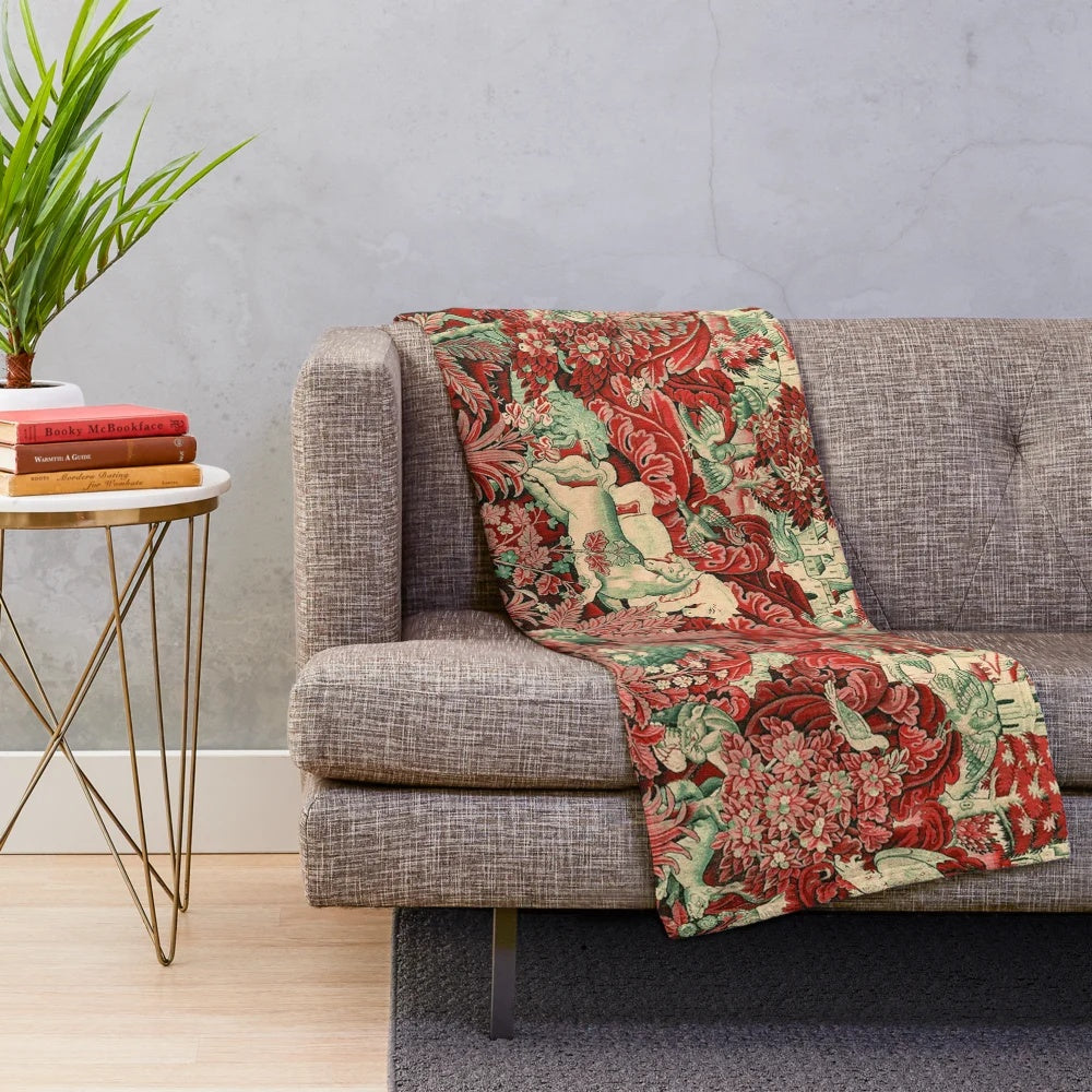 Plush blanket with antique French tapestry design featuring fantasy woodland creatures