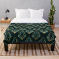 Emerald green and gold art deco patterned plush blanket