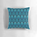 Sapphire blue throw pillow with an art deco feather pattern design
