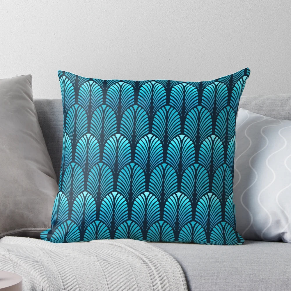Sapphire blue throw pillow with an art deco feather pattern design