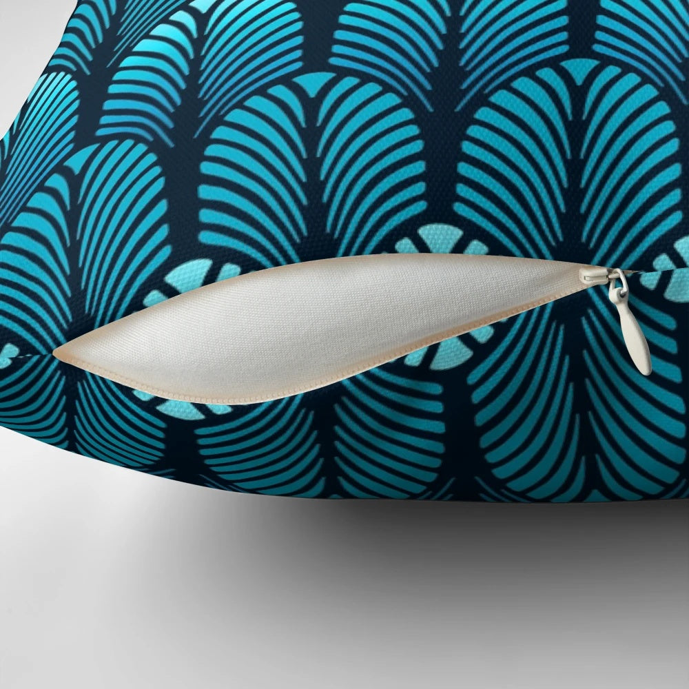 Sapphire blue throw pillow with an art deco feather pattern design