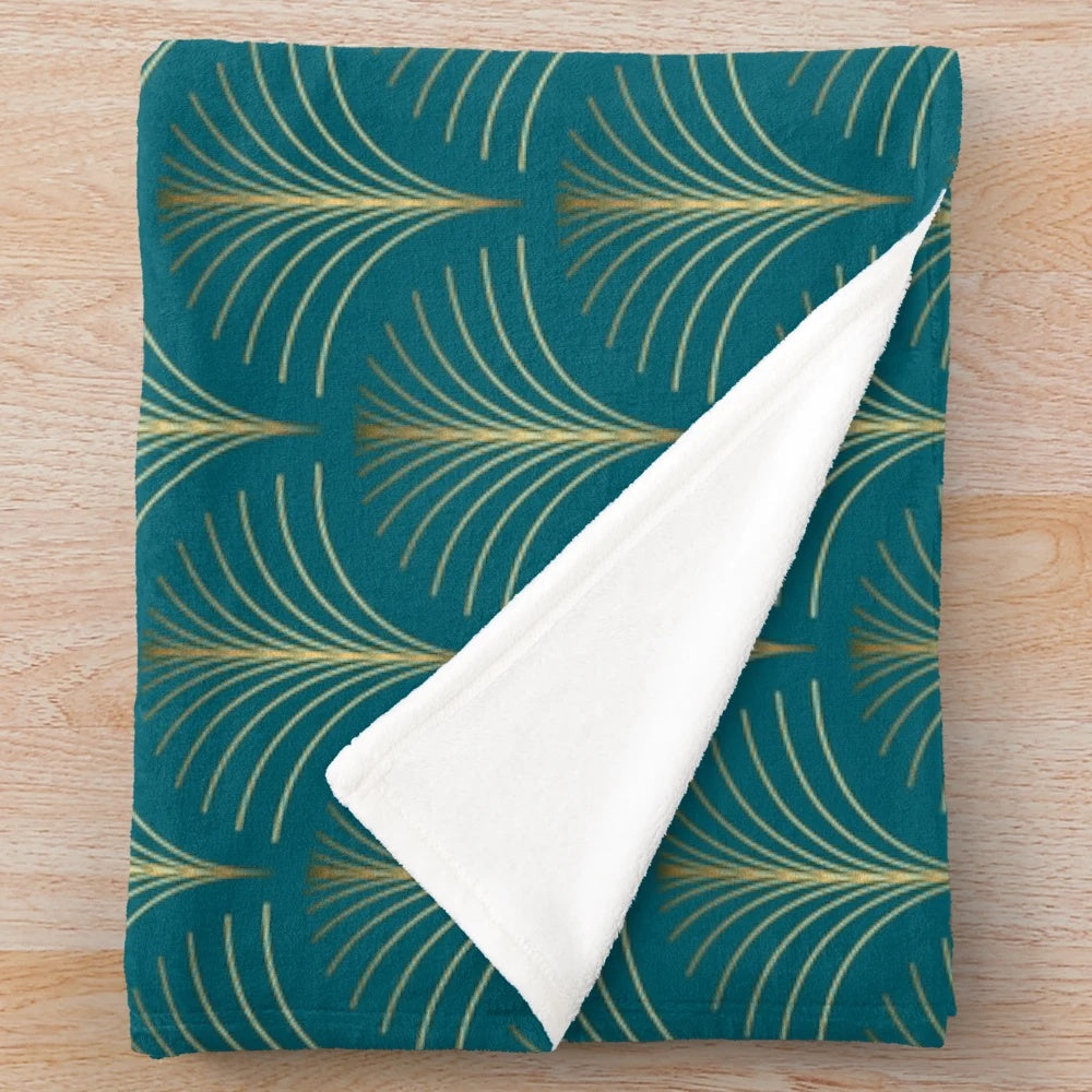 Plush blanket with art deco golden floral fan and turquoise green pattern