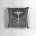 Decorative art deco-style pillow with geometric gold and black pattern