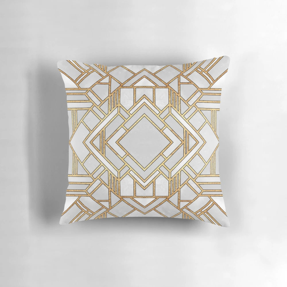Stylish art deco-inspired throw pillow with abstract geometric patterns in gold and white