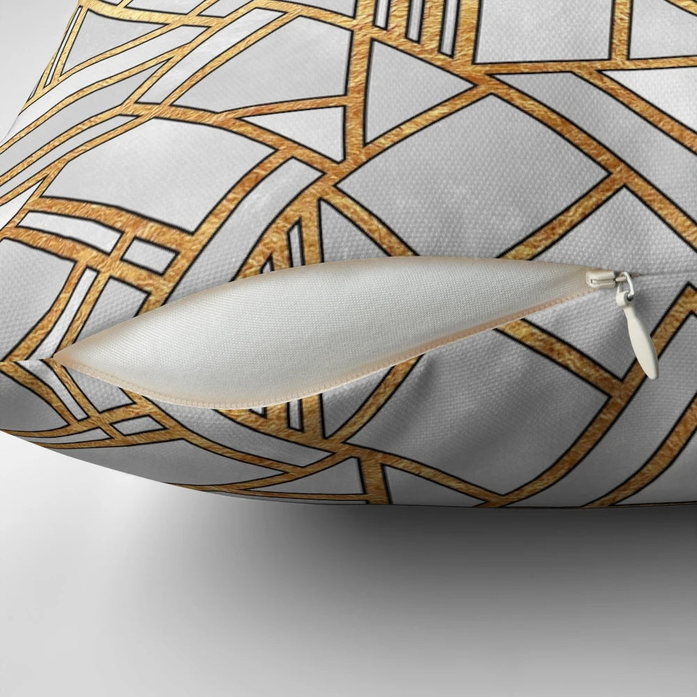 Stylish art deco-inspired throw pillow with abstract geometric patterns in gold and white