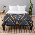 Art Deco-inspired plush blanket with abstract geometric patterns