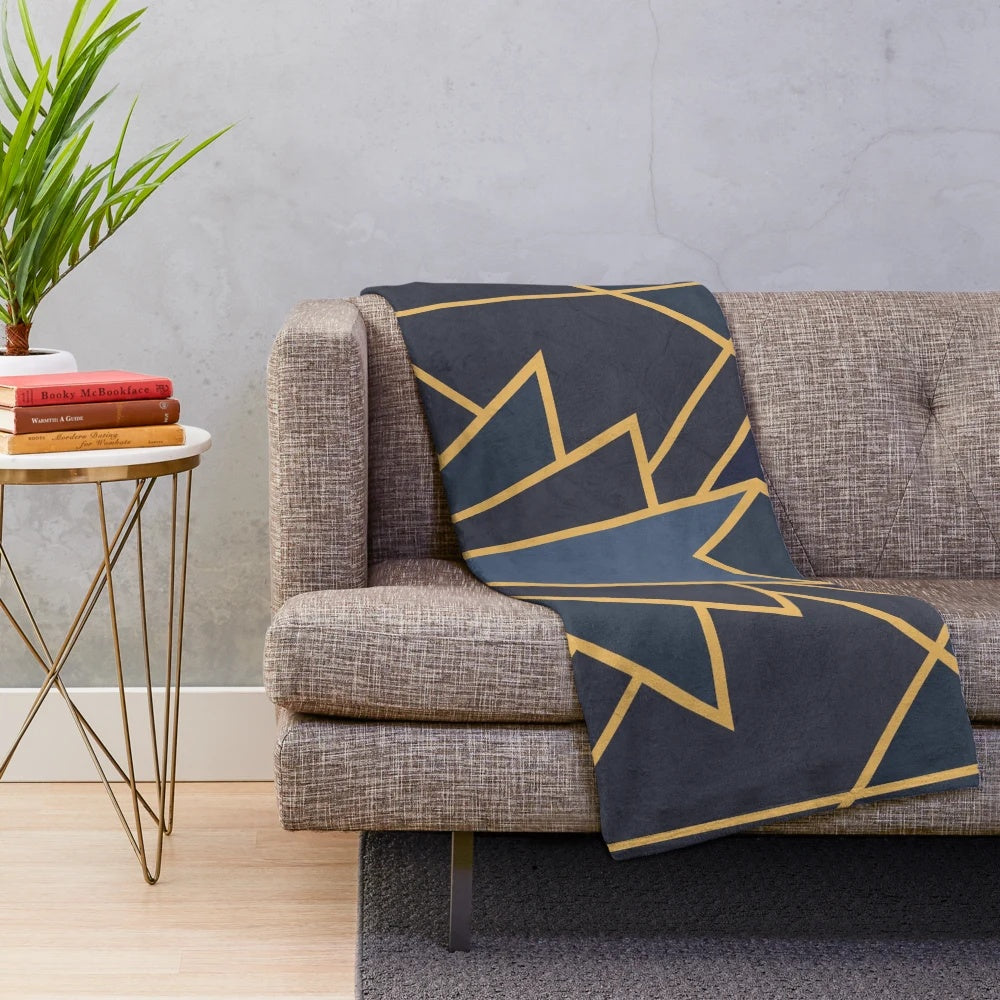 Art Deco-inspired plush blanket with abstract geometric patterns