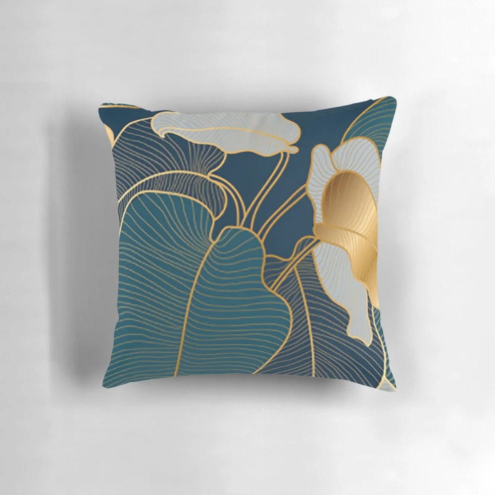 Luxurious art deco inspired pillow with botanical leaf pattern in shades of blue and green