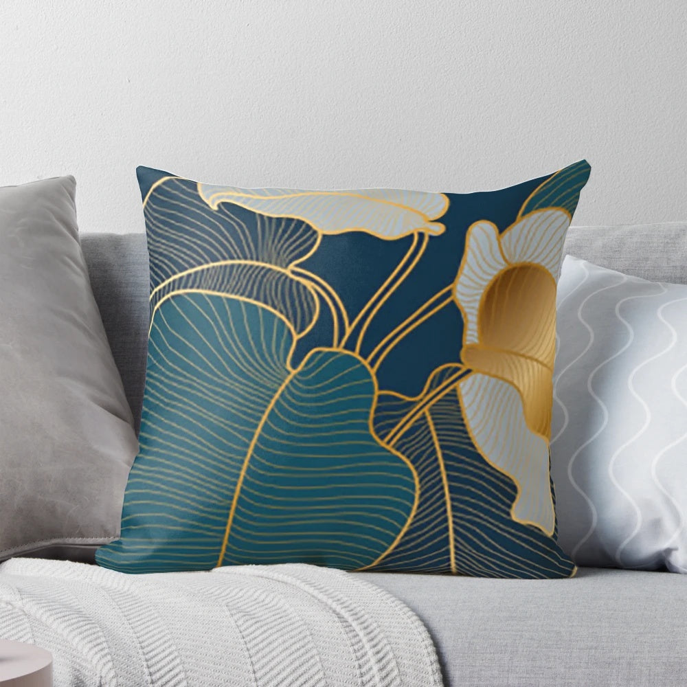 Luxurious art deco inspired pillow with botanical leaf pattern in shades of blue and green
