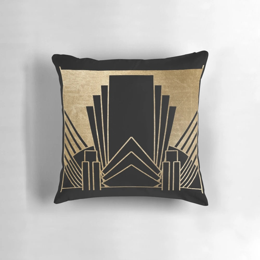 Decorative throw pillow with art deco inspired geometric and gold pattern design