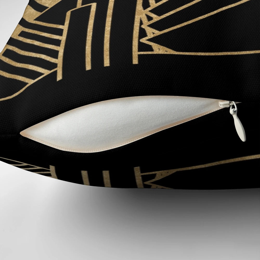 Decorative throw pillow with art deco inspired geometric and gold pattern design