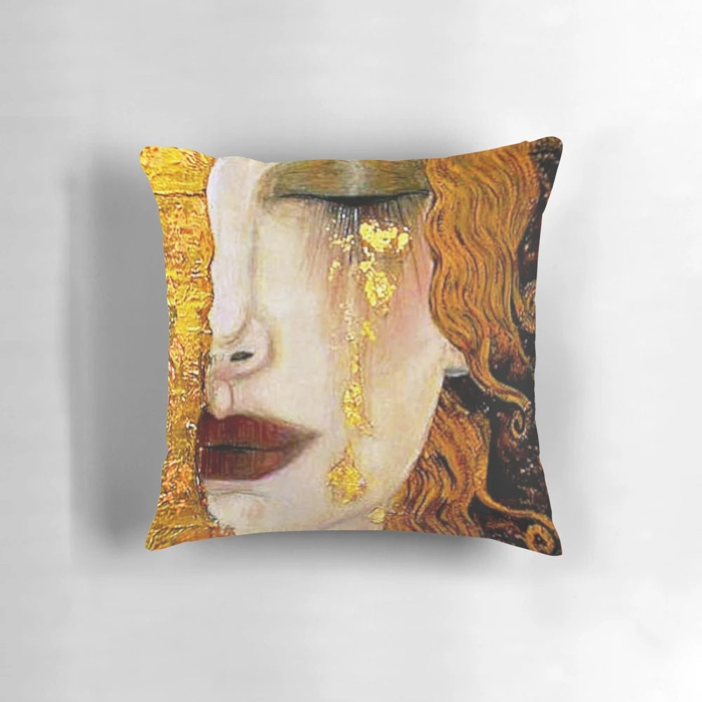 Decorative Art Nouveau-style pillow featuring Gustav Klimt's "Freya's Tears" painting of a woman in grief.