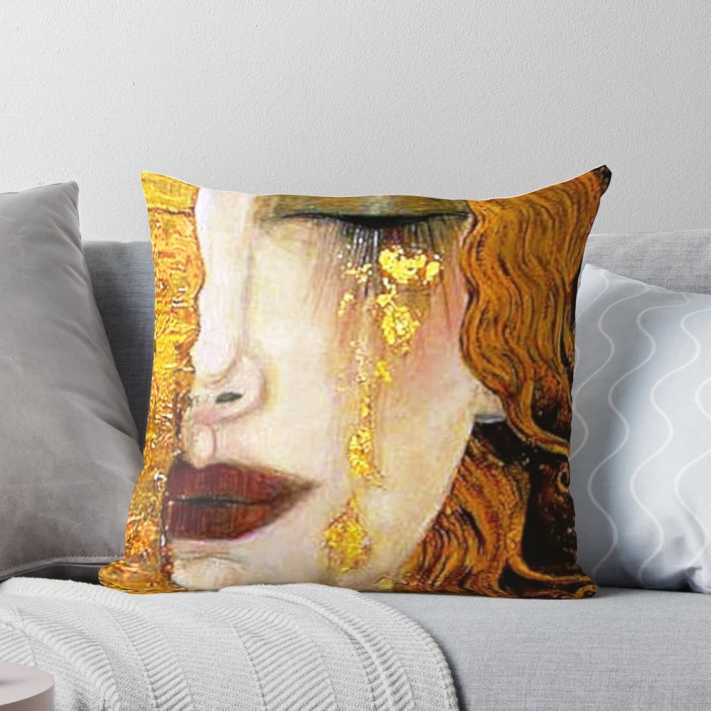 Decorative Art Nouveau-style pillow featuring Gustav Klimt's "Freya's Tears" painting of a woman in grief.