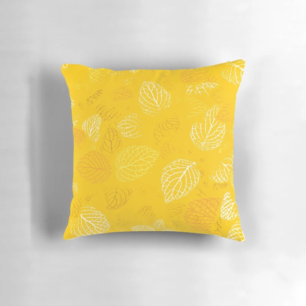 Autumn leaves pattern pillow with watercolor forest leaf design