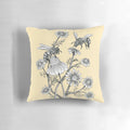 Pillow featuring a black and white ink drawing of bees and chamomile flowers on a honey-colored background