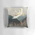 An elegant pillow featuring a watercolor-style design of a flying crane or bird in a nature landscape.