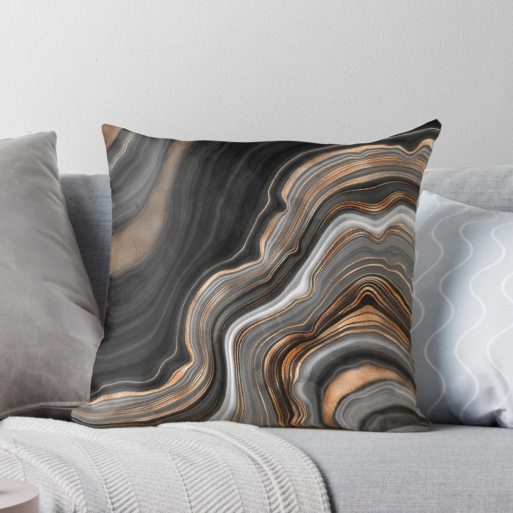 Luxurious black and gray marble-patterned throw pillow with golden veins, perfect for modern and bohemian home decor.