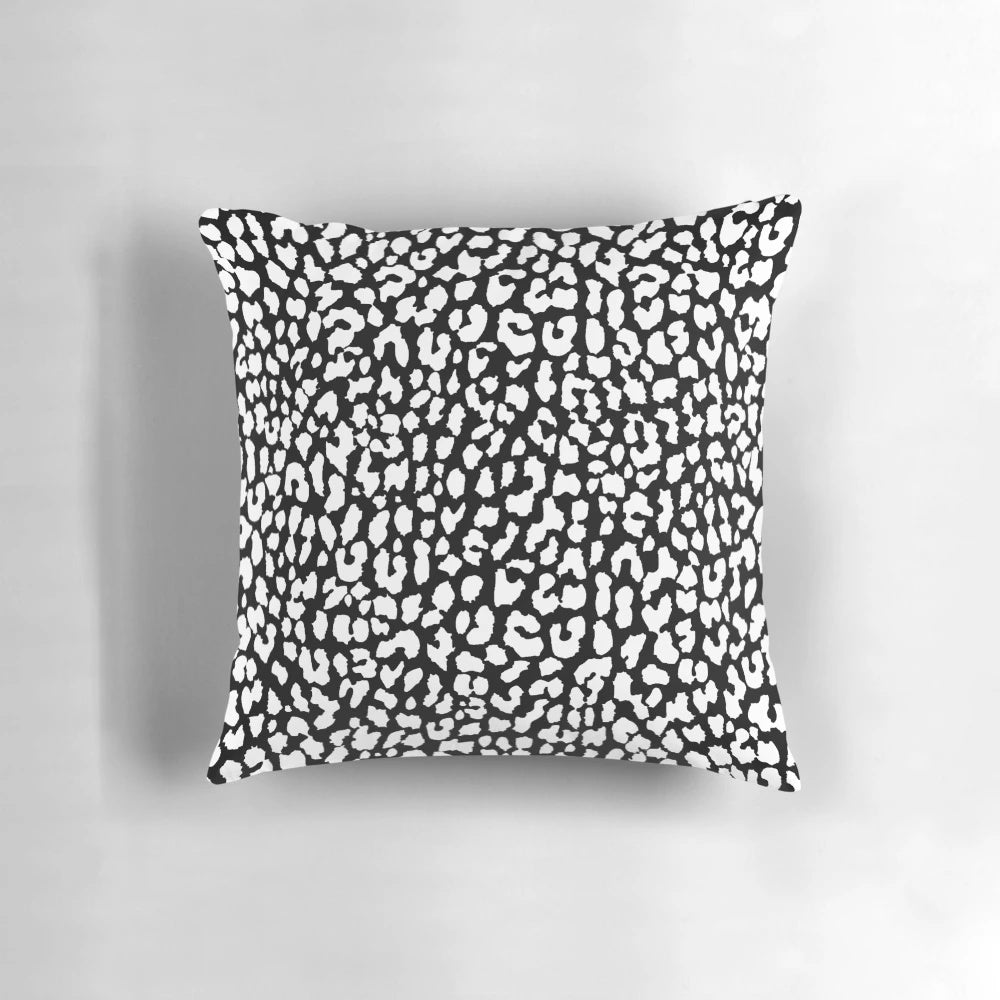 Soft, high-quality black and white leopard print pillow with a stylish, modern design