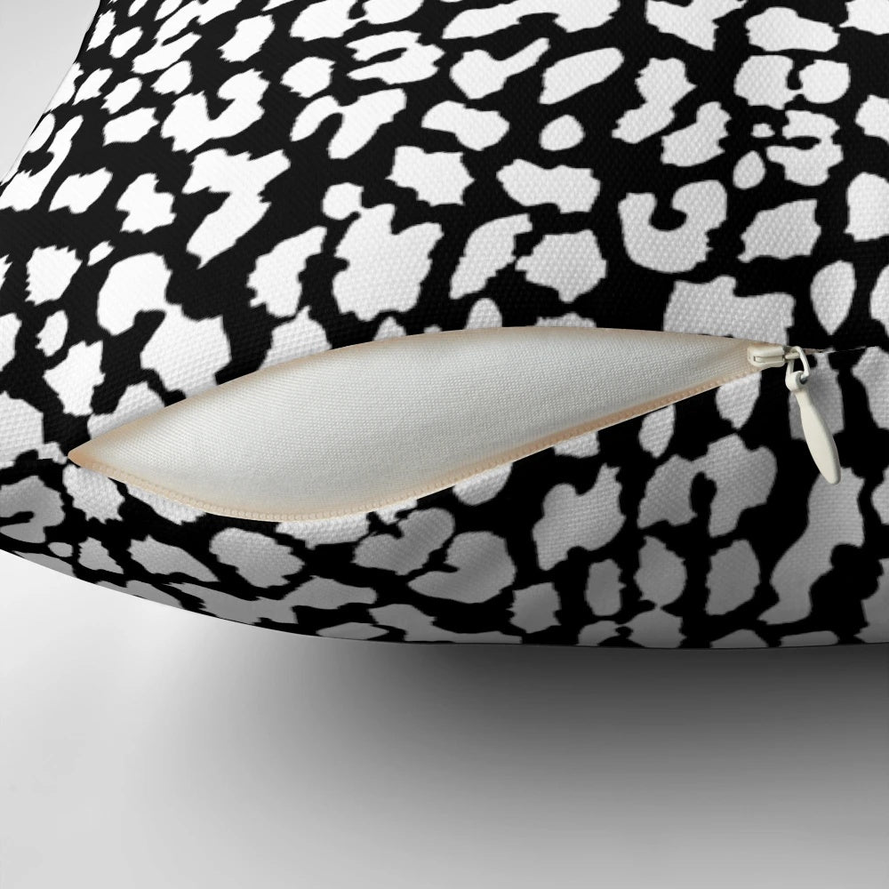 Soft, high-quality black and white leopard print pillow with a stylish, modern design