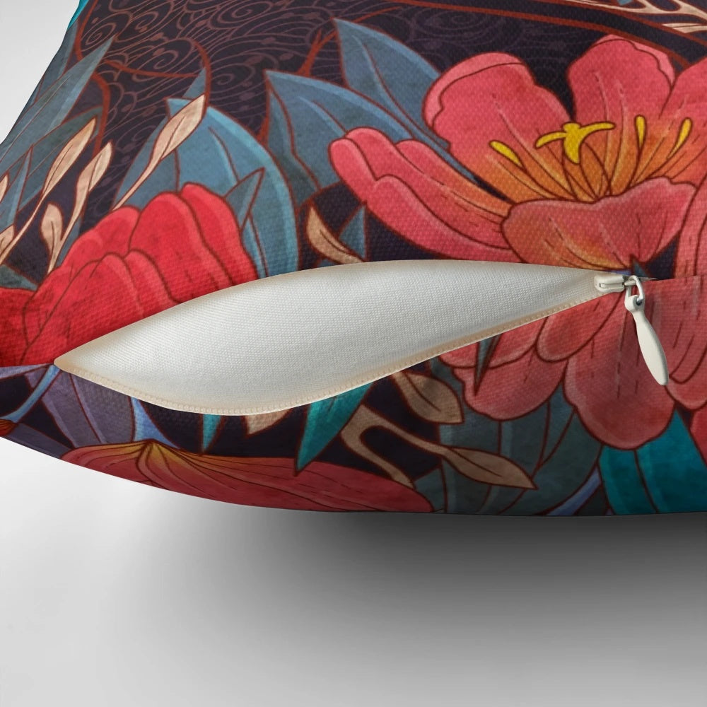 Illustration of a black cat surrounded by red tulip flowers on a decorative throw pillow