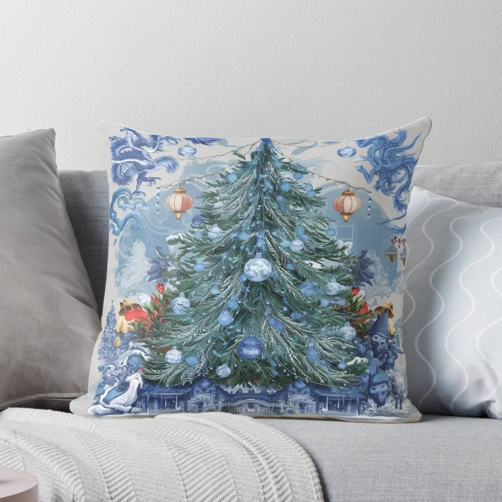 Blue and white chinoiserie-inspired Christmas tree pillow with pine branches, berries, and a bow