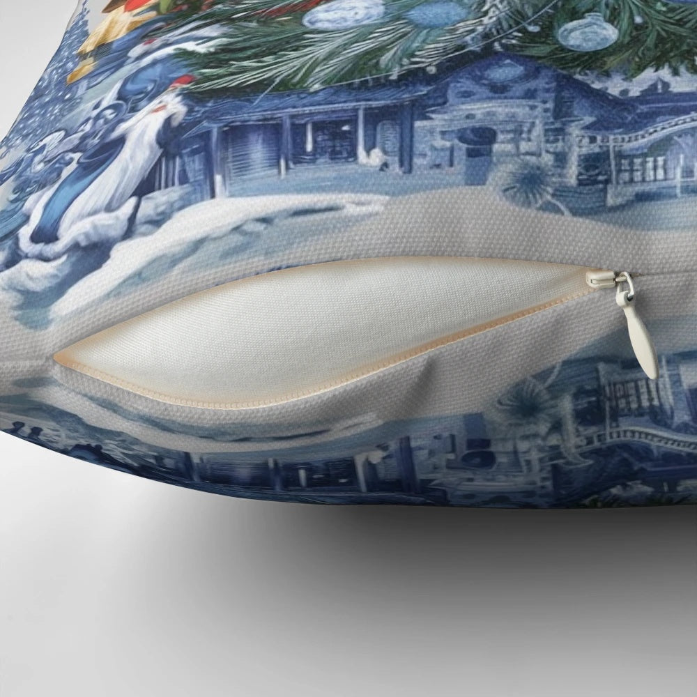 Blue and white chinoiserie-inspired Christmas tree pillow with pine branches, berries, and a bow