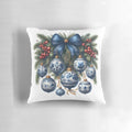 Blue chinoiserie-style Christmas pillow with berries, pine branches, and a bow