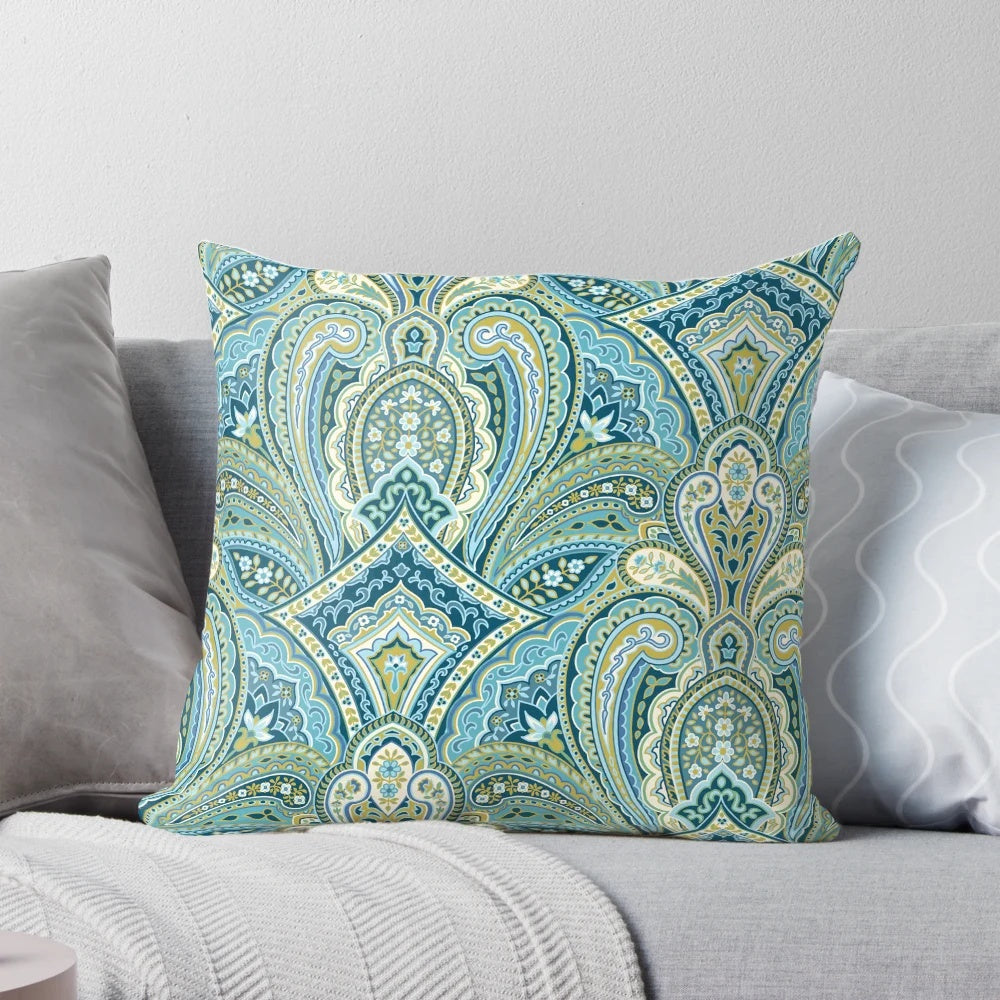 Soft, elegant blue paisley pattern pillow for a peaceful bedroom.