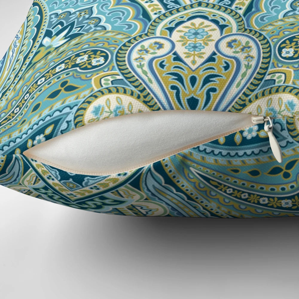 Soft, elegant blue paisley pattern pillow for a peaceful bedroom.