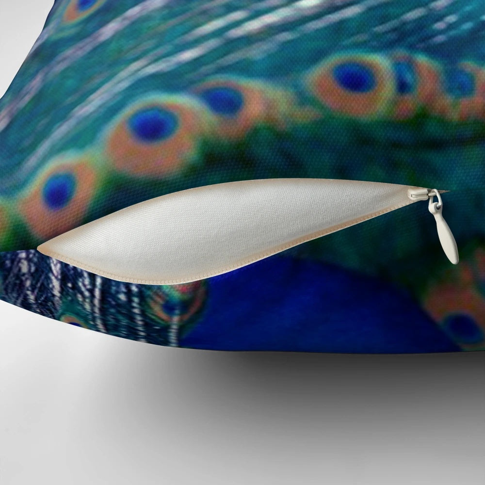 Striking blue peacock feather decorative throw pillow for cozy living spaces