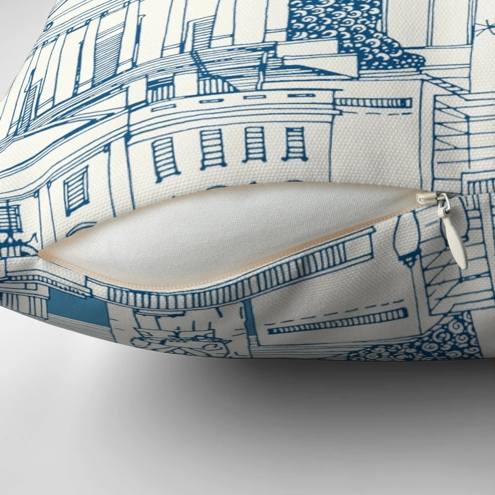 Blue and white toile pillow featuring iconic Washington DC landmarks like the Capitol Building, White House, and monuments.