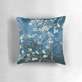 Vibrant blue pillow featuring Van Gogh's iconic Almond Blossoms painting