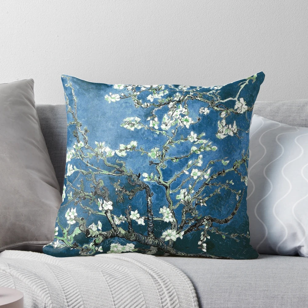 Vibrant blue pillow featuring Van Gogh's iconic Almond Blossoms painting