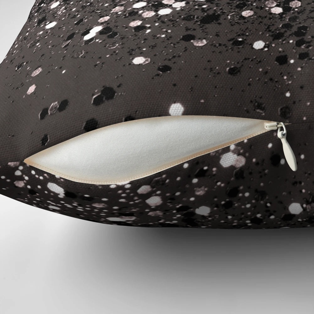 Soft, luxurious decorative pillow in a blush, gray, and black abstract pattern for a glamorous home accent.
