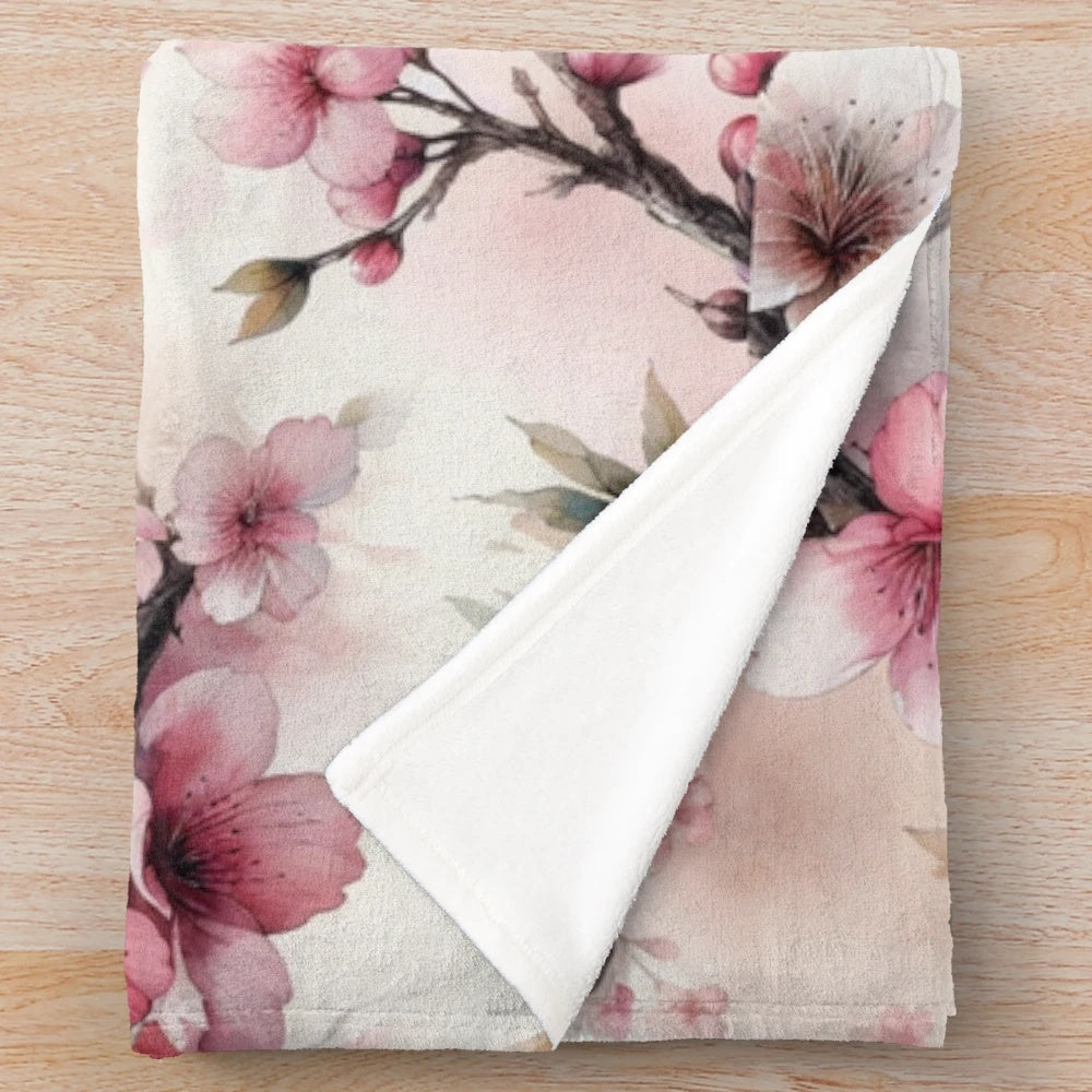Soft and plush cherry blossom pattern blanket for a cozy spring home