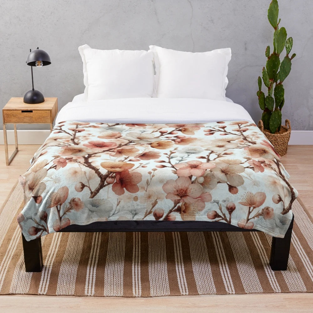 Soft and cozy plush blanket with a detailed cherry blossom floral pattern