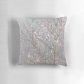 Soft, plush pillow featuring a beautiful cherry blossom floral design in shades of pink and grey.