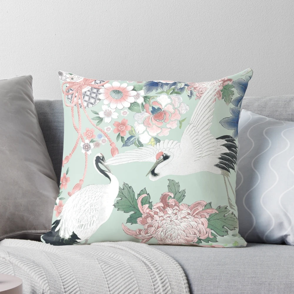 Elegant chinoiserie-inspired floral watercolor design on a soft, decorative pillow