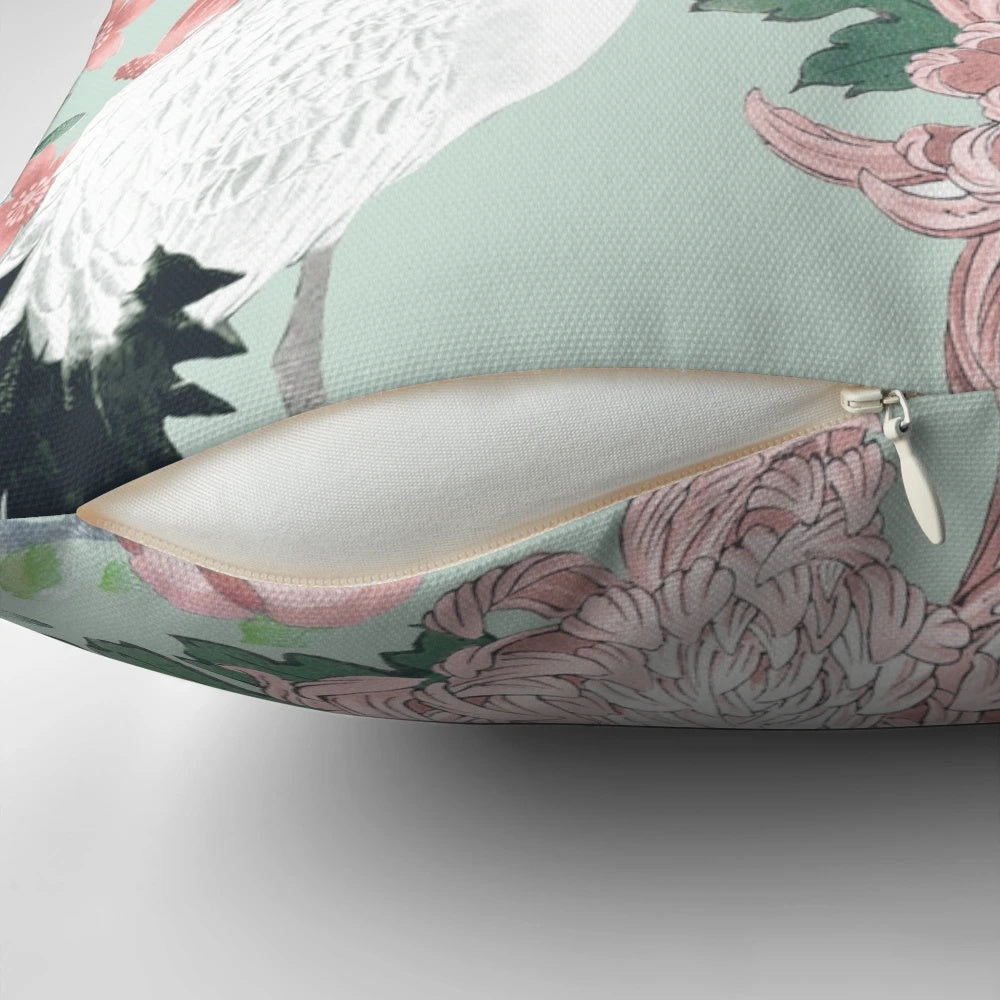 Elegant chinoiserie-inspired floral watercolor design on a soft, decorative pillow