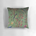 Antique-style chinoiserie-inspired decorative pillow with birds and floral motifs in blue and white colors
