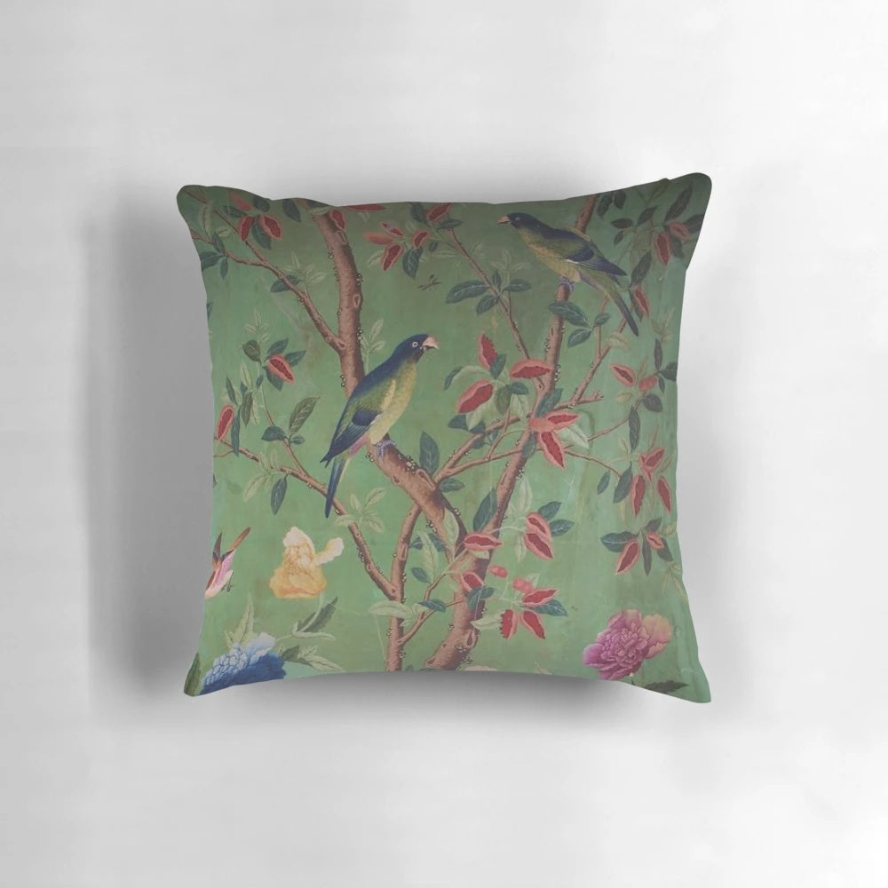Antique-style chinoiserie-inspired decorative pillow with birds and floral motifs in blue and white colors