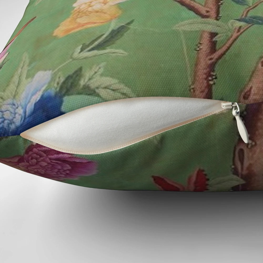 Antique-style chinoiserie-inspired decorative pillow with birds and floral motifs in blue and white colors